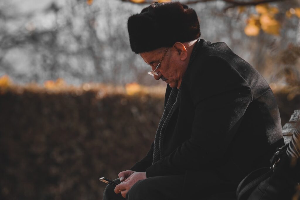 elderly sitting at the park