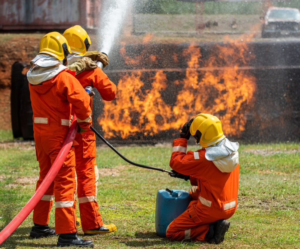 fire fighters putting off fire